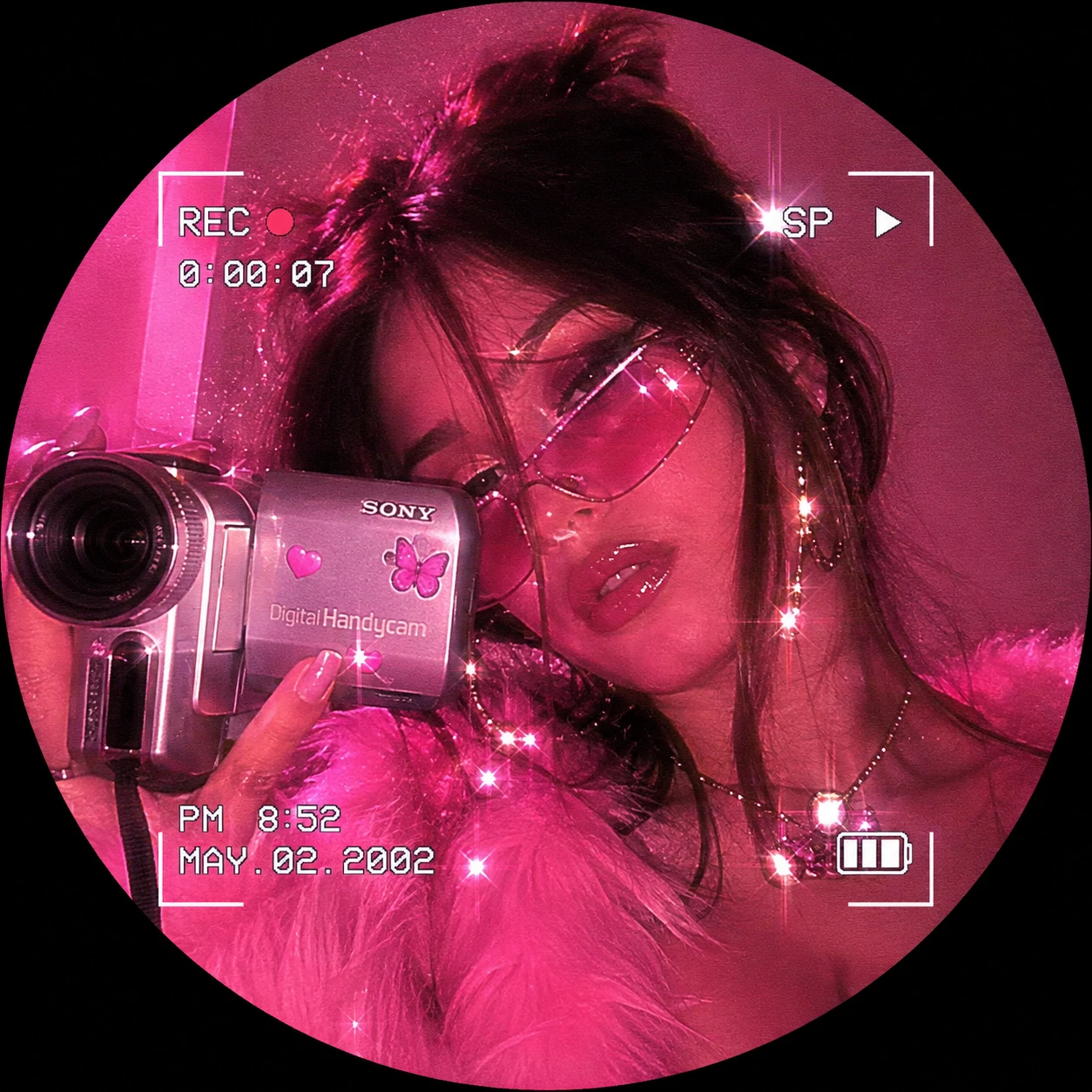 Pink Y2K profile picture with camcorder overlay and glitter lighting